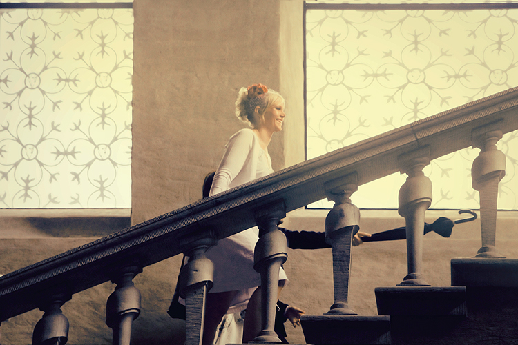 Elin & Fredrik walk up the stair to be wed