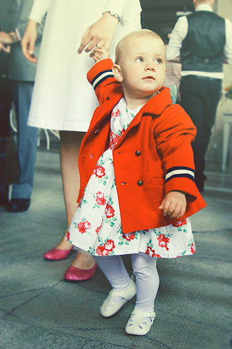 Emmy holds Elin's hand