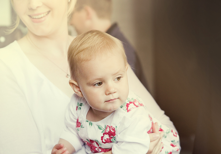 Emmy in her mother's arms