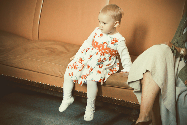 resting on the sofa before the ceremony
