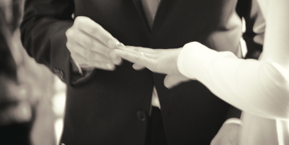 shaking hands exchanging rings