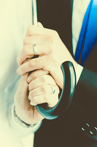 detail of hands and rings