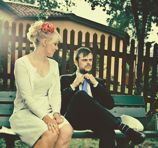 looking stylish on a park bench